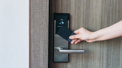 Electronic card key for open door in hotel. Smart card key to lock and unlock door. Security...