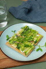 Sandwich with cheese, cucumbers and sunflower microgreens and alfalfa