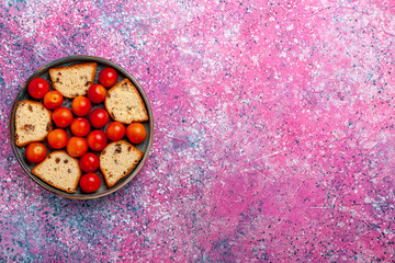 top view delicious sliced cake with sour fresh plums inside pan on light pink background pie sweet sugar bake biscuit cookie fruit