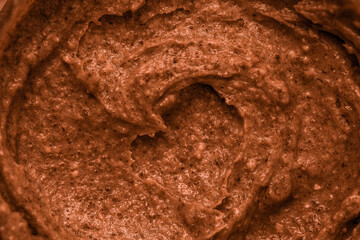 Chocolate souffle cocktail with nuts and banana. Protein smoothie shake close-up. Chocolate ice cream with nuts.