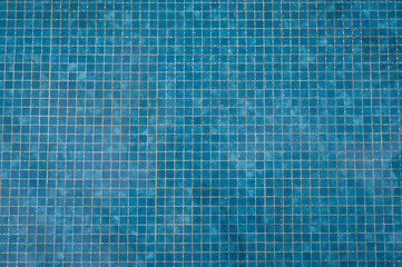 Bottom of pool with blue tiles