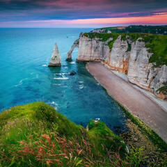 Admirable coastline with high cliffs at sunset, Etretat, Normandy, France