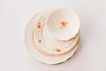 Closeup of porcelain plates and bowls