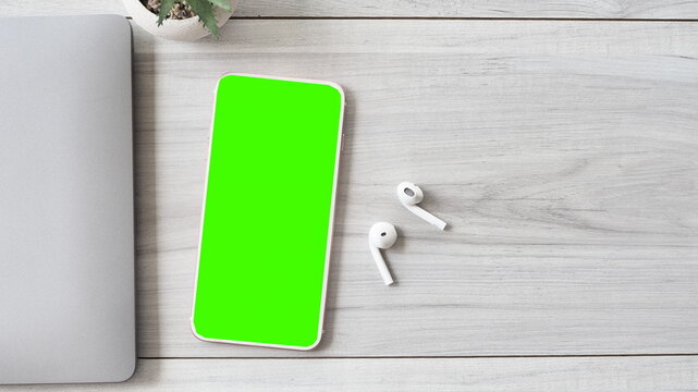 Phone mobile telephone with a vertical green screen technology cell phone on white background isolate
