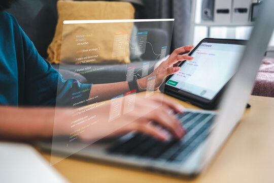 Concept programmer, Developer programming and coding technology, Hand Close up asianwoman using laptop and tablet artificial coding business data analytics programming.