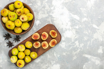 top view fresh sweet figs delicious fruits on light white desk fruit fresh mellow photo