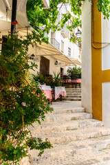 Small romantic outdoor restaurant in narrow street in Dalt Vila Ibiza