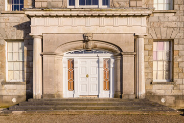 Main entrance door of an old stately home.