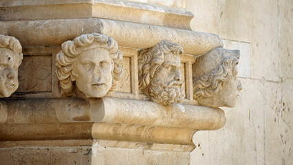 Stone head details of St. James Cathedral