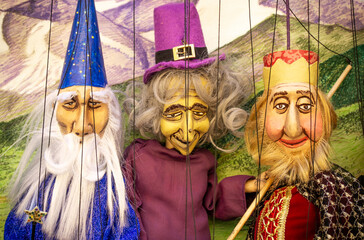 Three Funny Puppet Characters of a King, a Witch and a Wizard From a Marionettes Show with Painted...