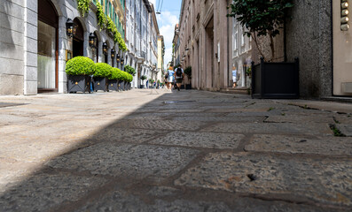 shot from below the famous Via della Spiga, one of the streets in the historic center of Milan that...