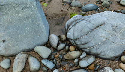 Pebbles on beach background