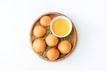 Ruddy cottage cheese pancake with sauce isolated