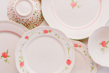 Closeup of porcelain plates and bowls