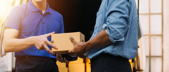 Entrepreneurs Small Business SME Independent men work at home Use smartphones and laptops for commercial checking, online marketing, packing boxes, SME sellers, concept, e-commerce team, online sales