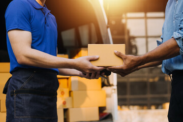 Entrepreneurs Small Business SME Independent men work at home Use smartphones and laptops for commercial checking, online marketing, packing boxes, SME sellers, concept, e-commerce team, online sales