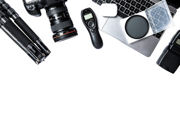 Flat lay composition with equipment for journalist, laptop, flash, camera, lens, tripod, trigger,...