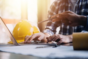 Architect having a meeting with construction team on site