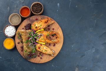 top view tasty fried fish with seasonings and pomegranates on dark background meat seafood dinner dish water color meal free space