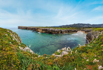 Fototapeta na wymiar Guadamia beach (or Aguamia) rocky coast summer scenery. Asturias, Spain.