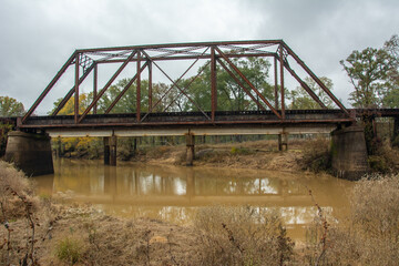 Howe railroad truss bridge over the Big Cypress Bayou in Jefferson, Marion County, Texas, USA
