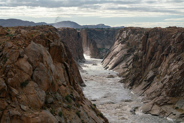 Fototapeta na wymiar Augrabies Falls National Park in South Africa with the Orange River running through it.