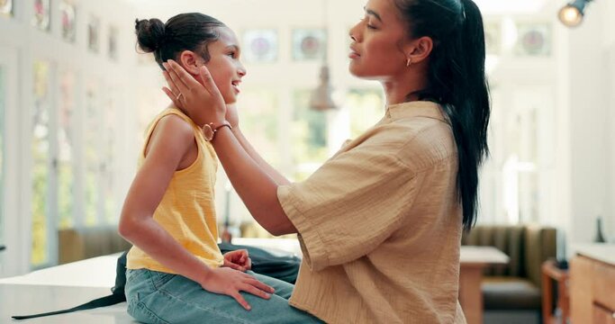 Mother, thumbs up and child ready for school on a kitchen table with a backpack and kiss. Woman, girl kid and together at home to prepare for education or learning with love and care of a mom
