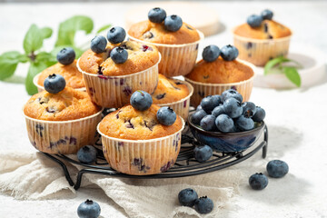 Healthy vegan banana blueberry muffins with fresh berries
