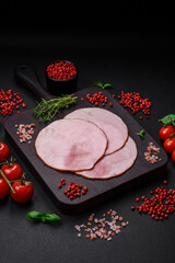 Delicious fresh ham cut into round slices with salt, spices and herbs