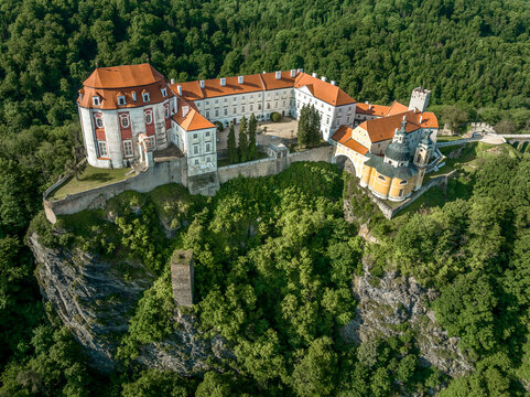 Aerial panorama view of the Thaya river curving at Vranov nad Dyji with old Gothic castle structure turned into a representative Baroque residence with  the extensive landscape park