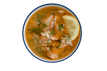 Soup with salmon in a plate isolated on white background
