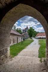 Pernstejn castle framed by the fortified gate arch