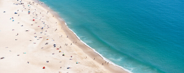View from above from a cliff on the coast of the Atlantic Ocean near the city of Nazare in Portugal