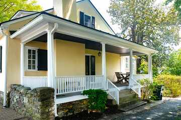 American single-story house. Traditional American-style home with beautiful landscaping.