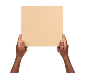 Man holding a blank rectangular piece of brown cardboard isolated on white or transparent background