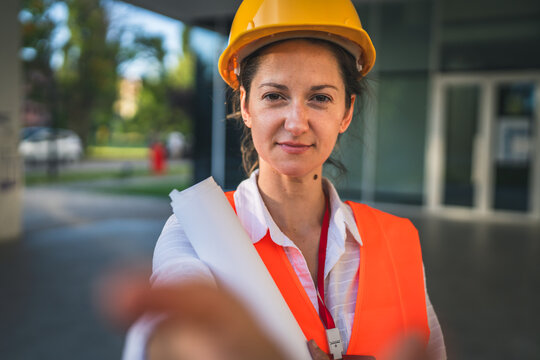architect woman female construction engineer stand outdoors
