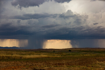Scenic landscape heavy raining clouds in evening