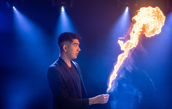 Man showing trick with fire