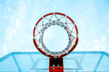 basketball hoop bottom view against the sky © Natalia Udalova
