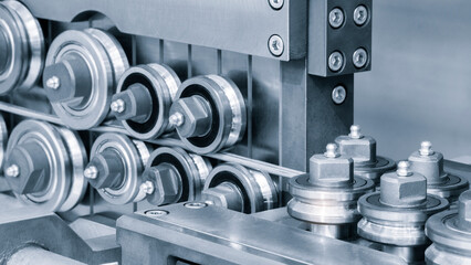 Metalworking concept background, production of metal wire rod, industrial production line