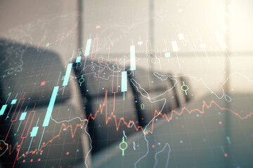 Multi exposure of virtual abstract financial chart hologram and world map on a modern meeting room background, research and analytics concept