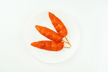 Chicken fillet inner skewers.Food concept.Fresh raw marinated chicken meat skewers iner fillet on a white background.Top view.Copy space.Food for retail.Ogranic food,healthy eating.