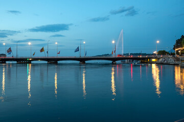 Sunset view of Rhone River and city of Geneva, Switzerland