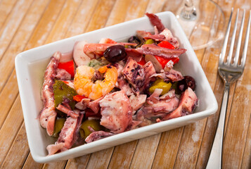 Traditional Spanish seafood salpicon - cold salad from mix of seafood and vegetables