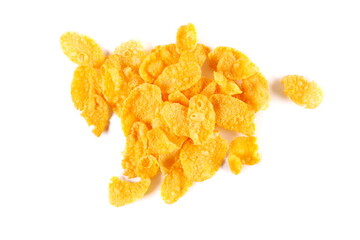 Crunchy corn flakes, cereal, muesli pile isolated on white, top view