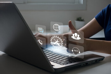 technical support concept, help online, Businessman using laptop with helpdesk icon on screen, Hotline assistance service available by phone, chat, email, Technical support customer service concept.