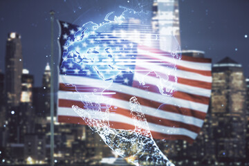 Multi exposure of abstract creative digital world map hologram on USA flag and blurry skyscrapers background, research and analytics concept