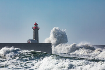 Farolim de Felgueiras during heavy winds with huge waves breaking over the light house