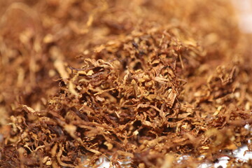 Rolling dried tobacco leafs close up background big size high quality stock photos smoking addict self made cigarettes and joints