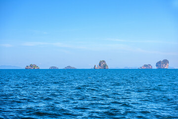 Topical islands in open sea on a sunny day, Ao Nang, Mueang Krabi District, Krabi, Andaman Sea,...
